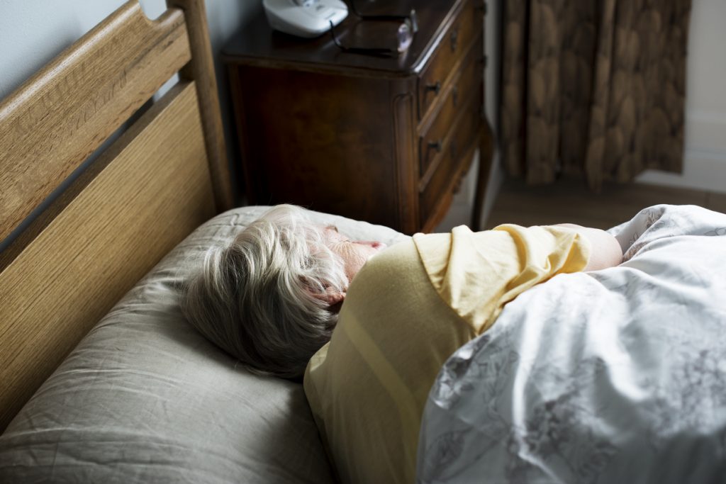Diabetic woman sleeping soundly thanks to thermal diabetic socks